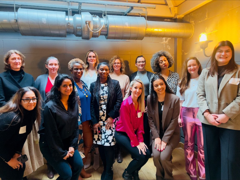 A group of women celebrating at ARKK's International Women's Day event